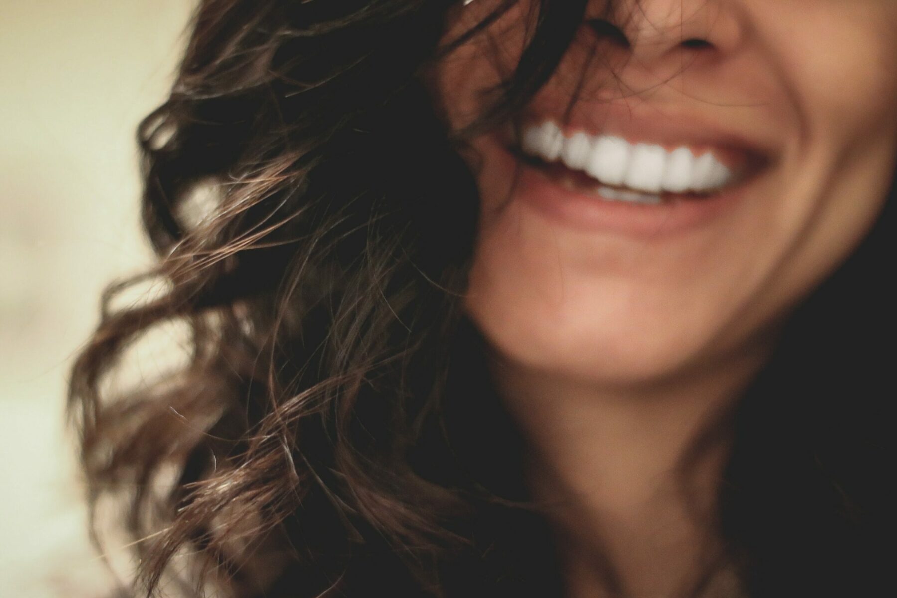 Close up of someone smiling.