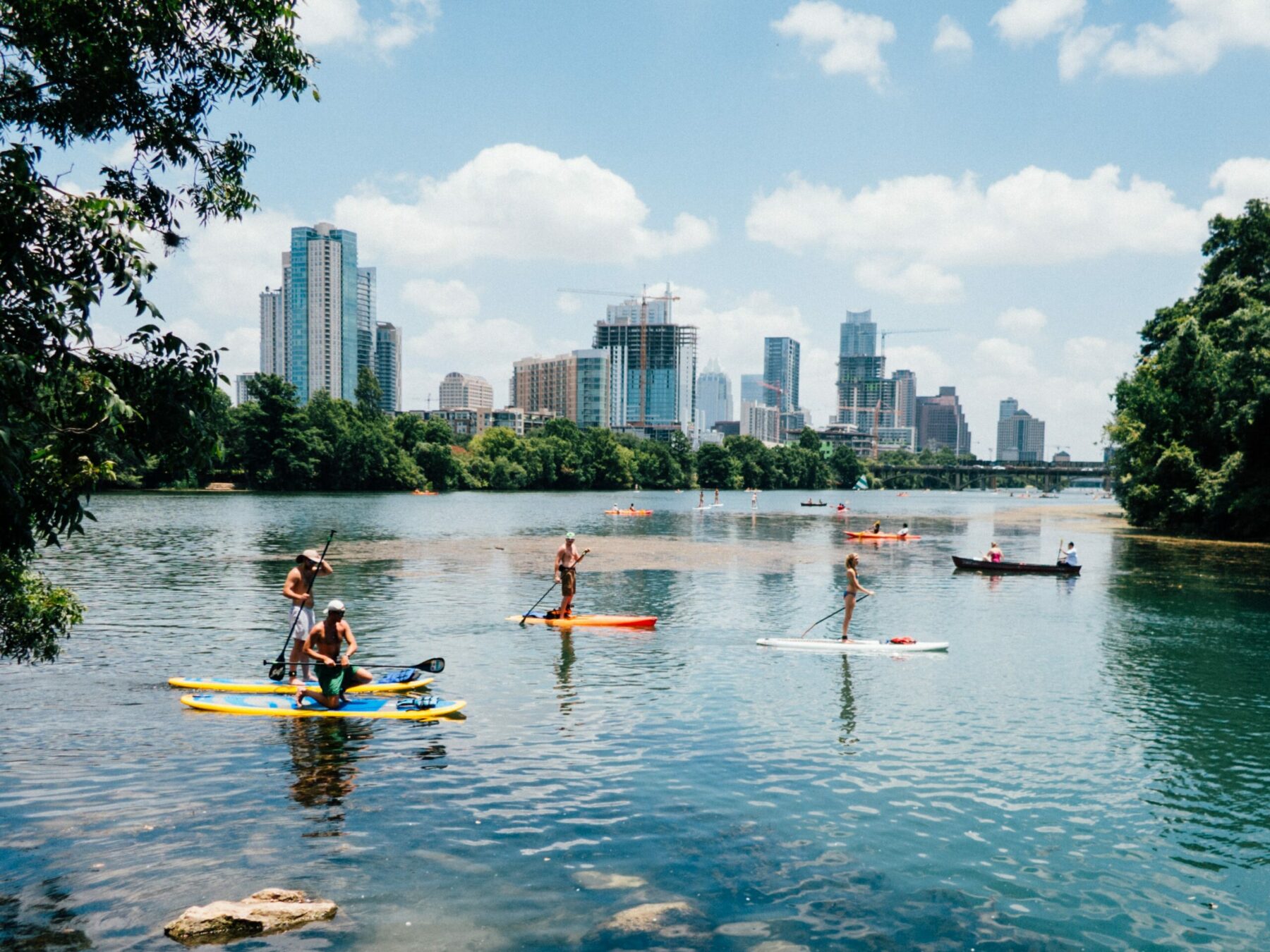 People paddleboarding in Austin.