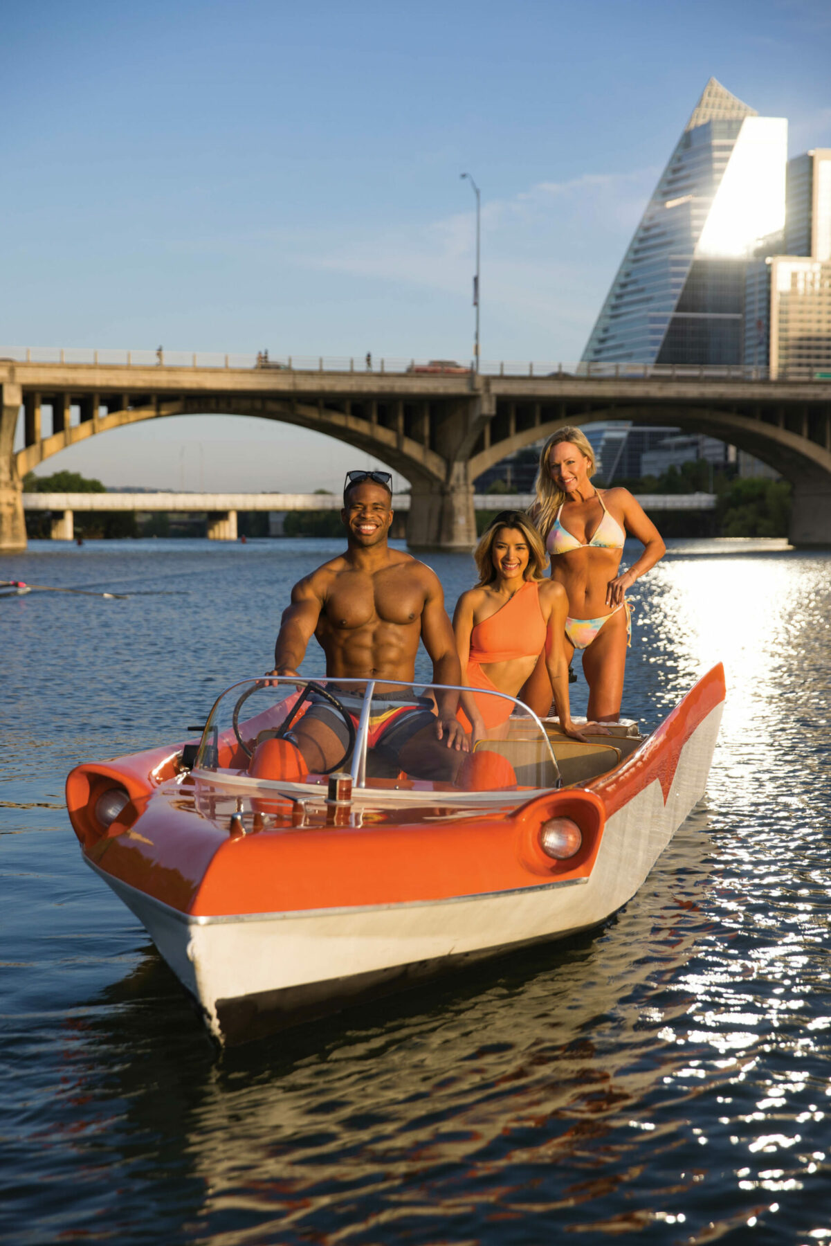 Swimsuit models on boat.