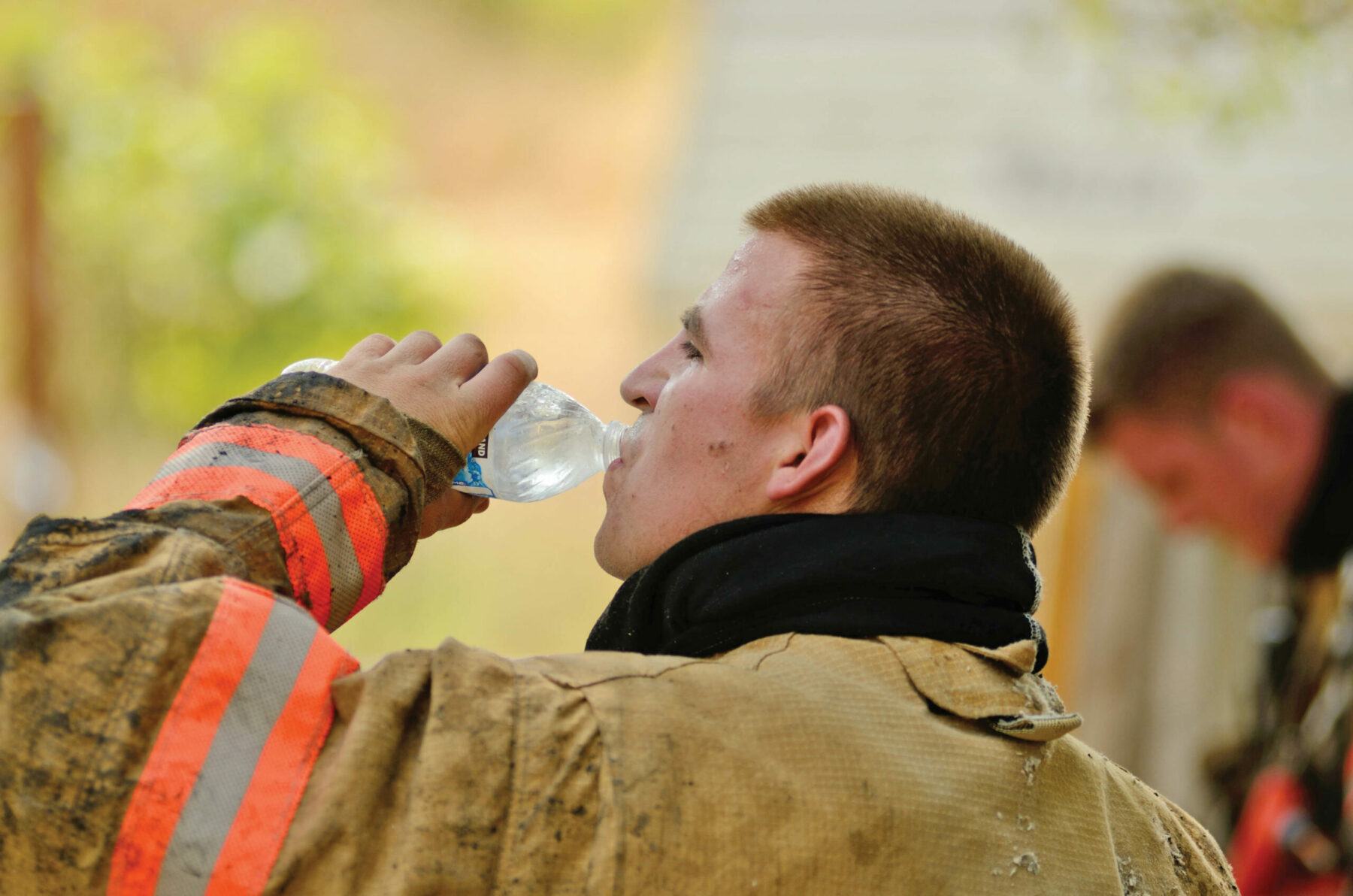 Firefighter drinking water.