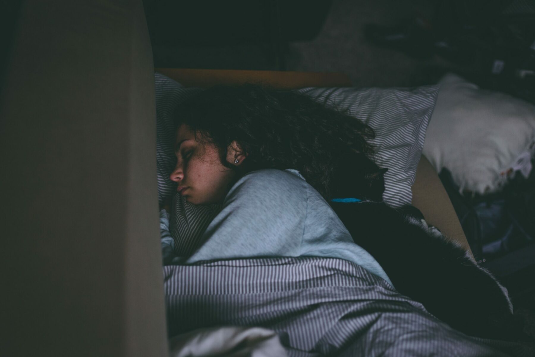 A woman in bed asleep.
