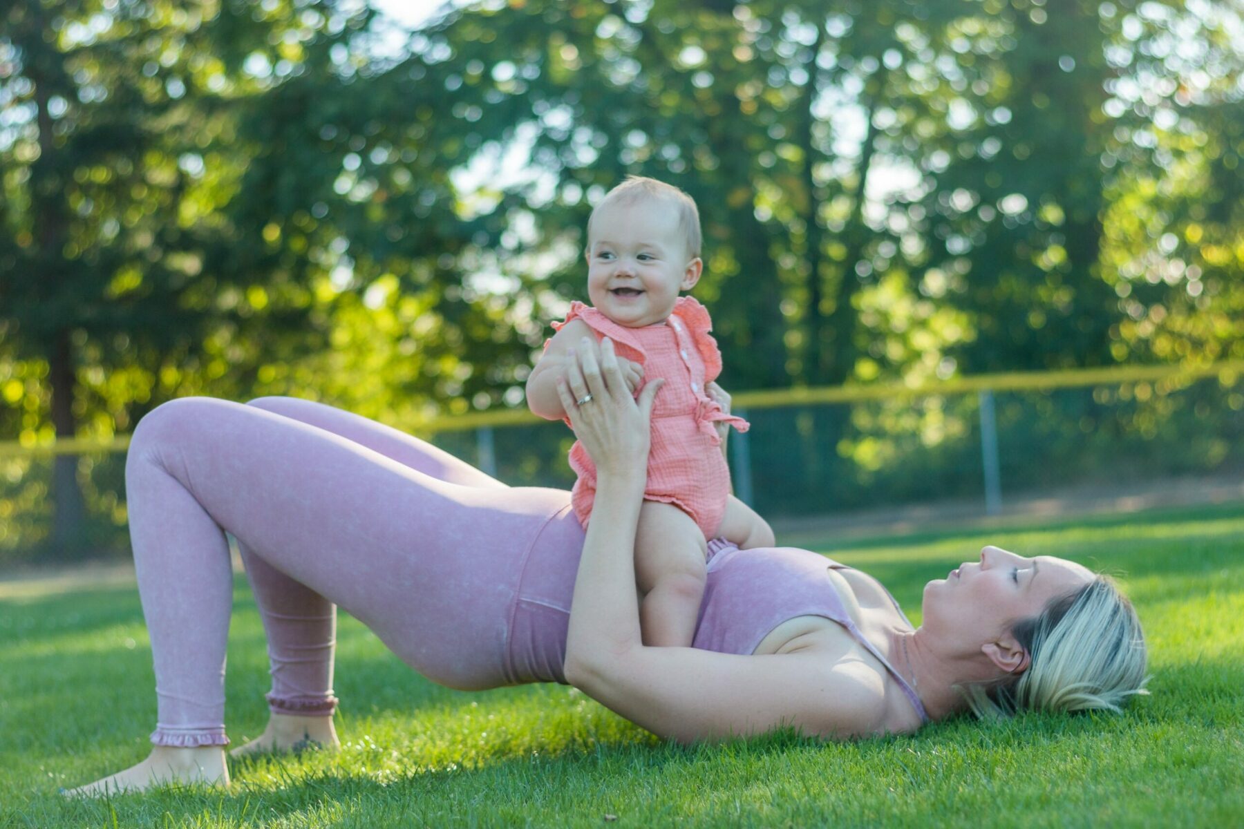 Mom and baby exercising.