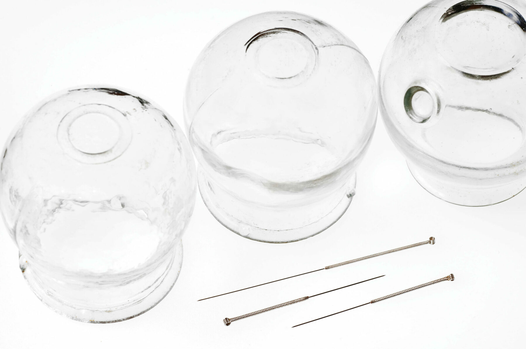 acupuncture needles and cupping glasses.