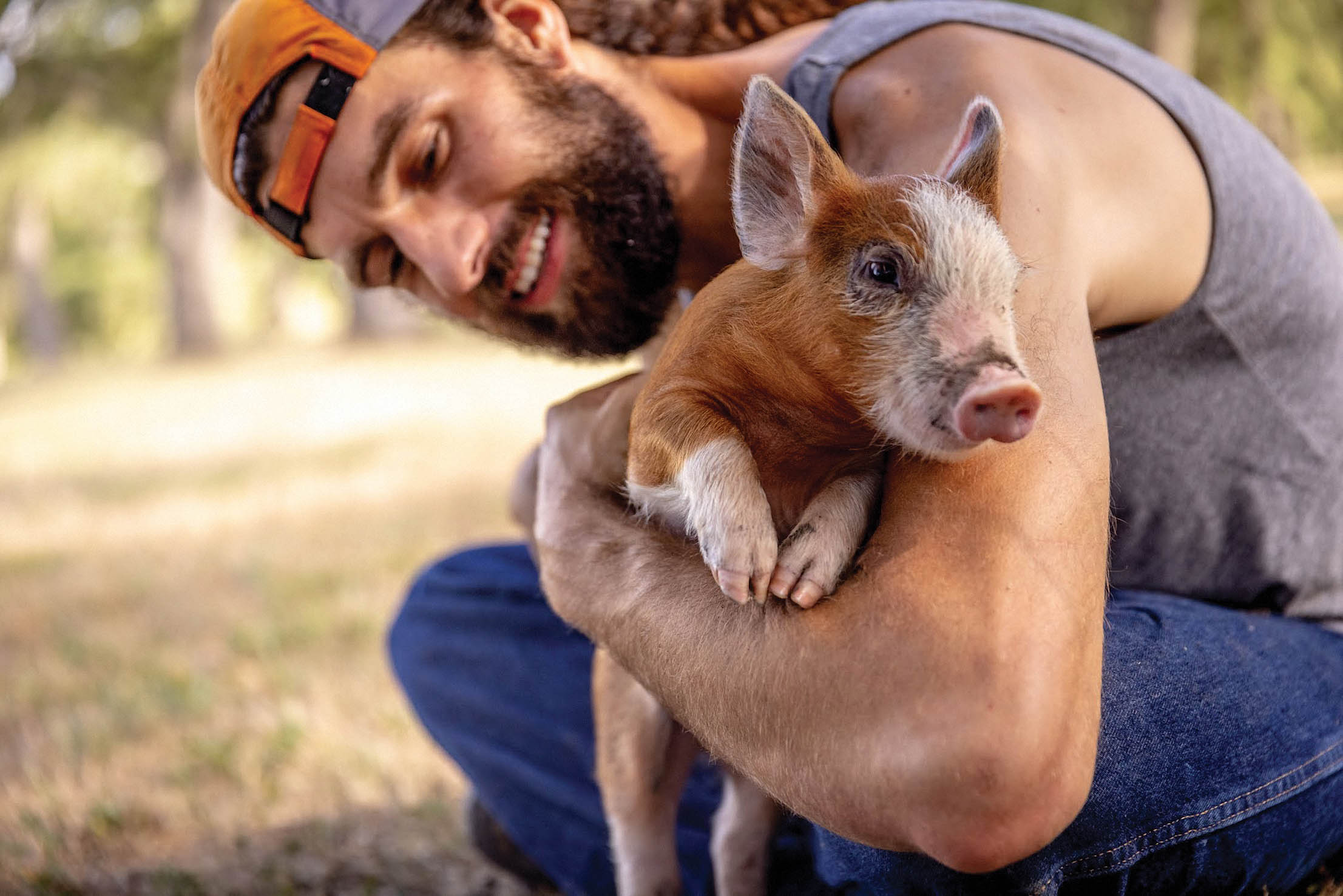 Man and pig.