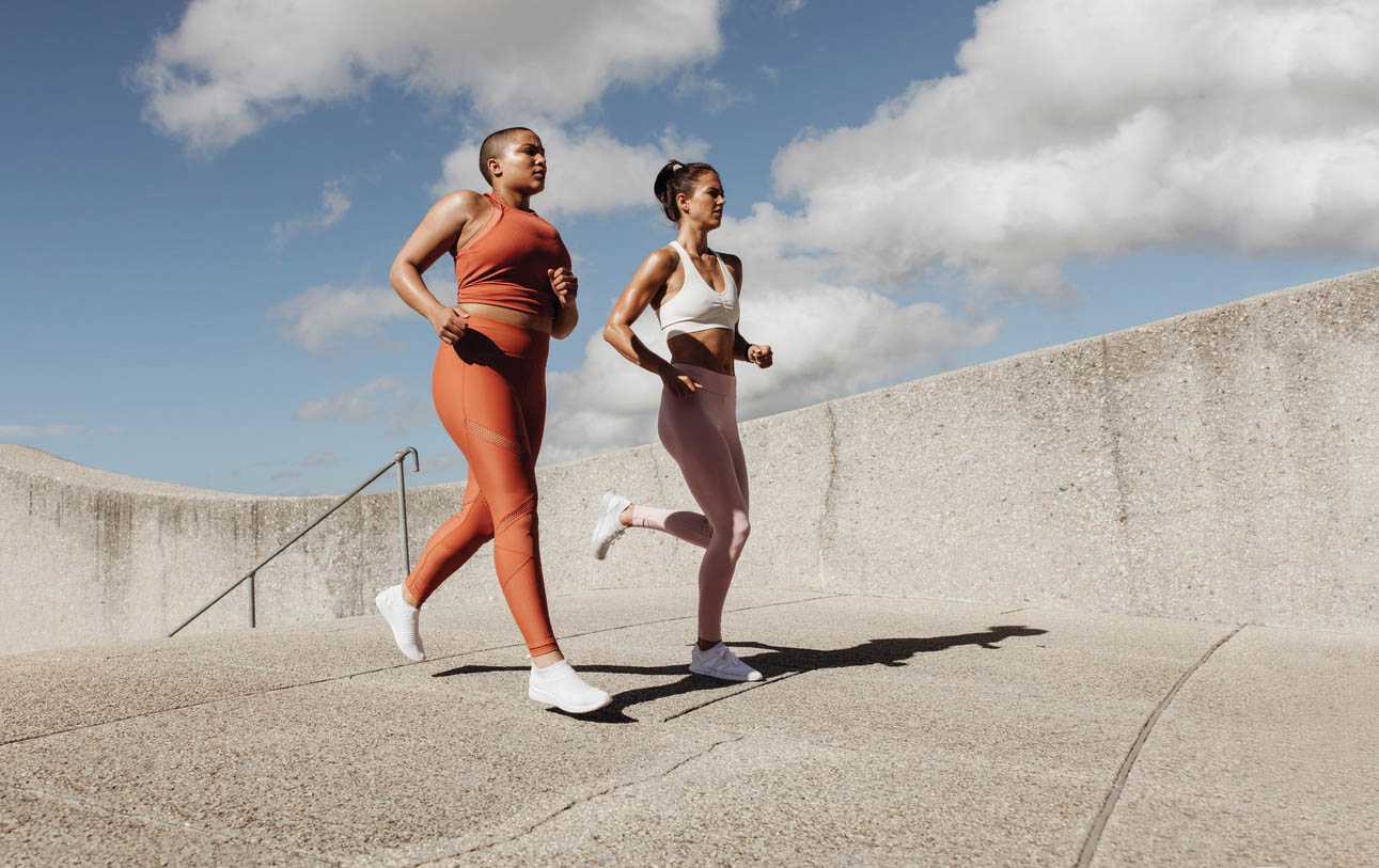 Women jogging together.
