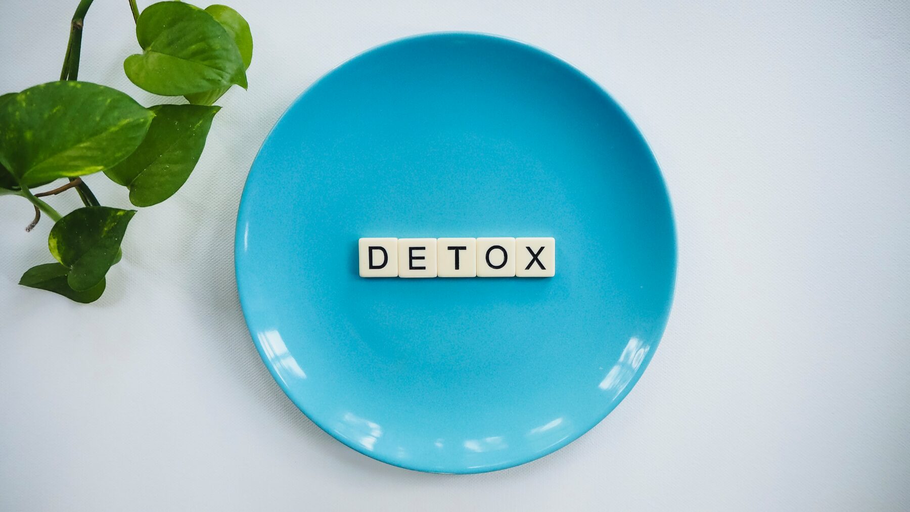 Plate with word detox over it.