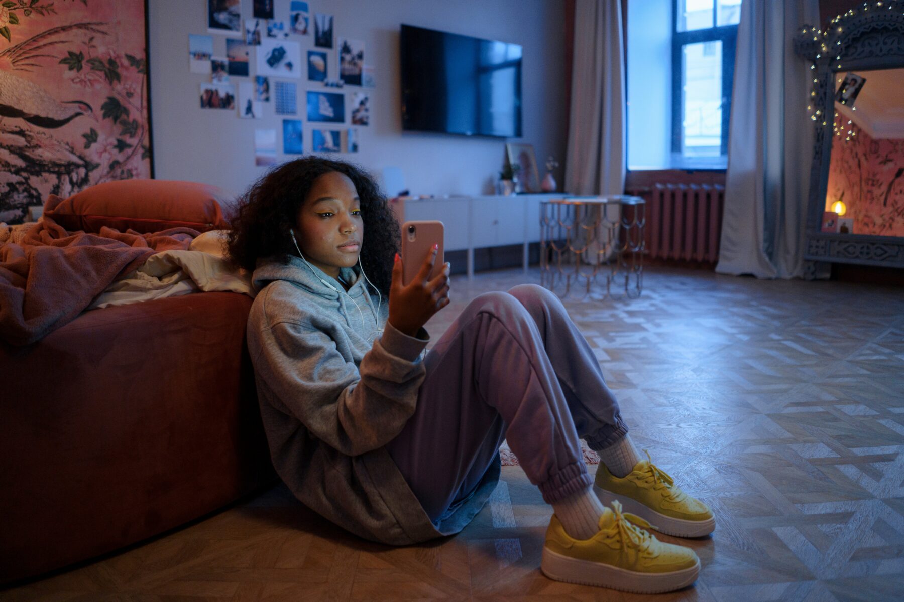 Teenager using phone.