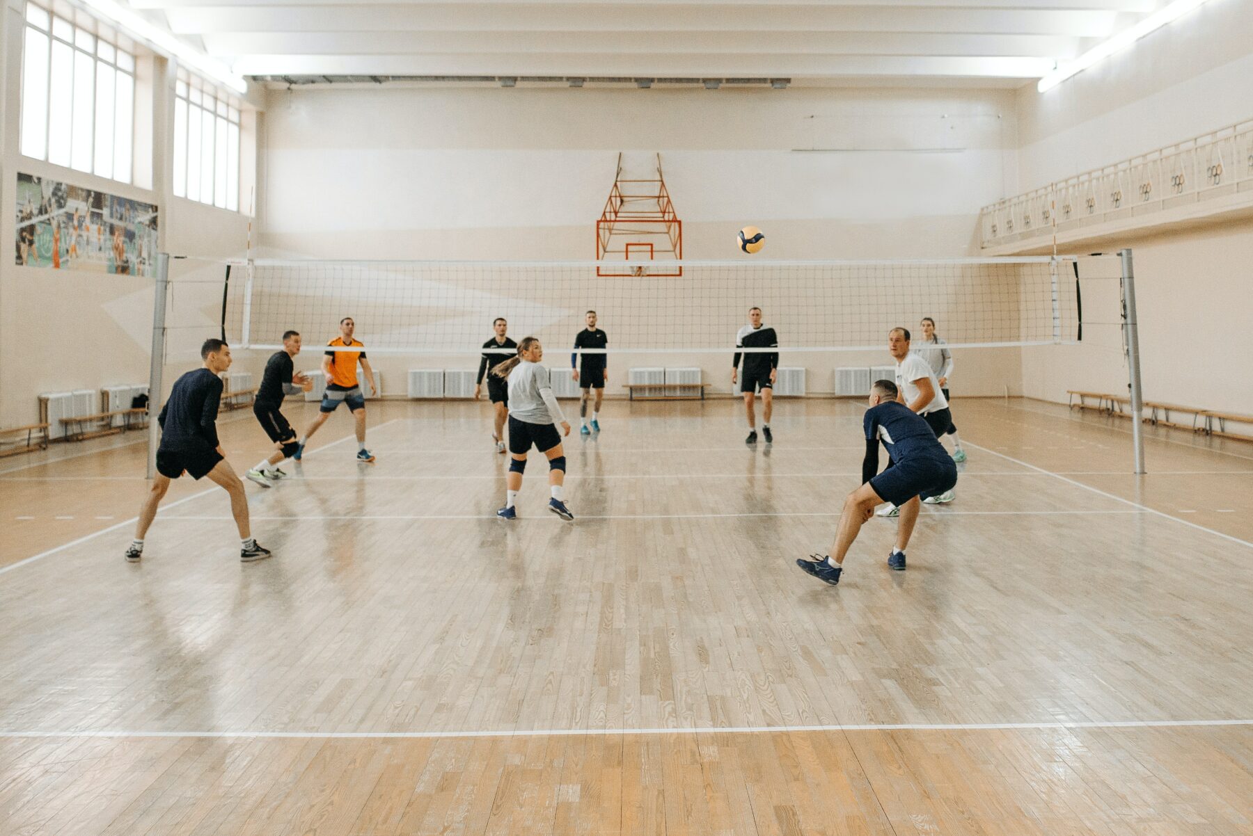 People playing volleyball.